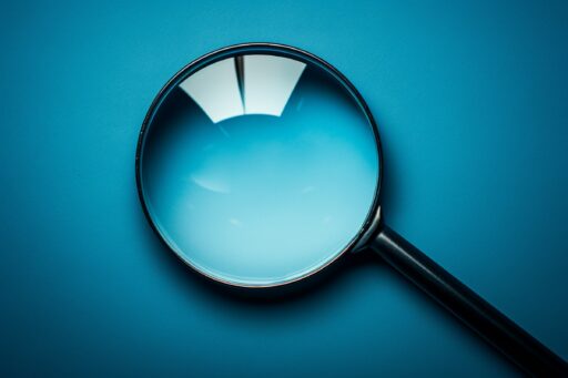 SEO signified by a photo of a magnifying glass representing search