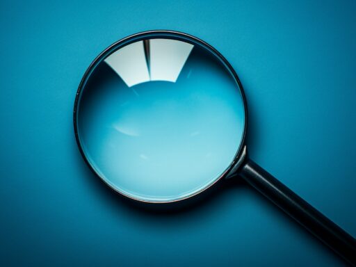 SEO signified by a photo of a magnifying glass representing search